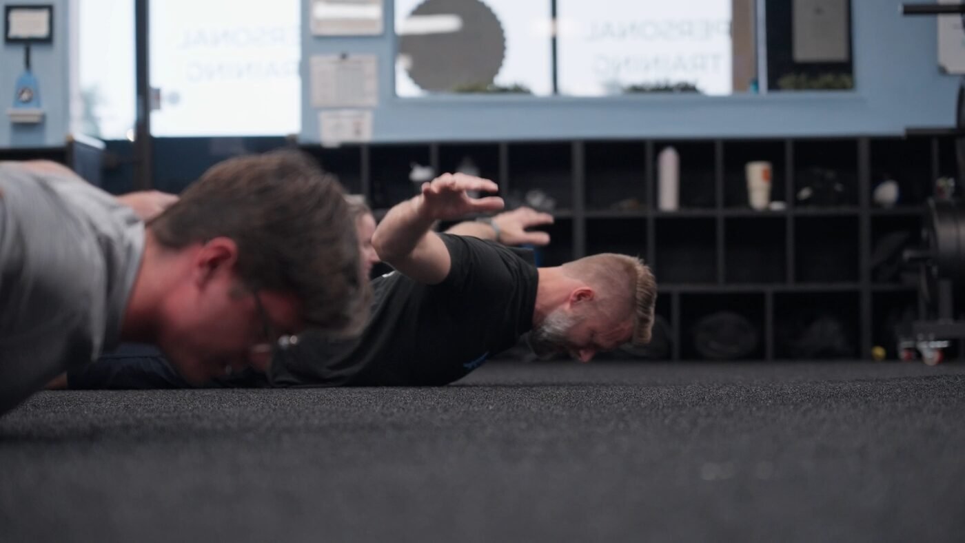 Fitness clients exercising in a gym — the kind of dynamic short-form content that performs on social media