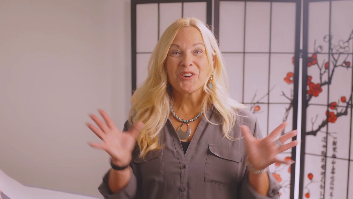 Business owner speaking on camera during a professionally filmed interview