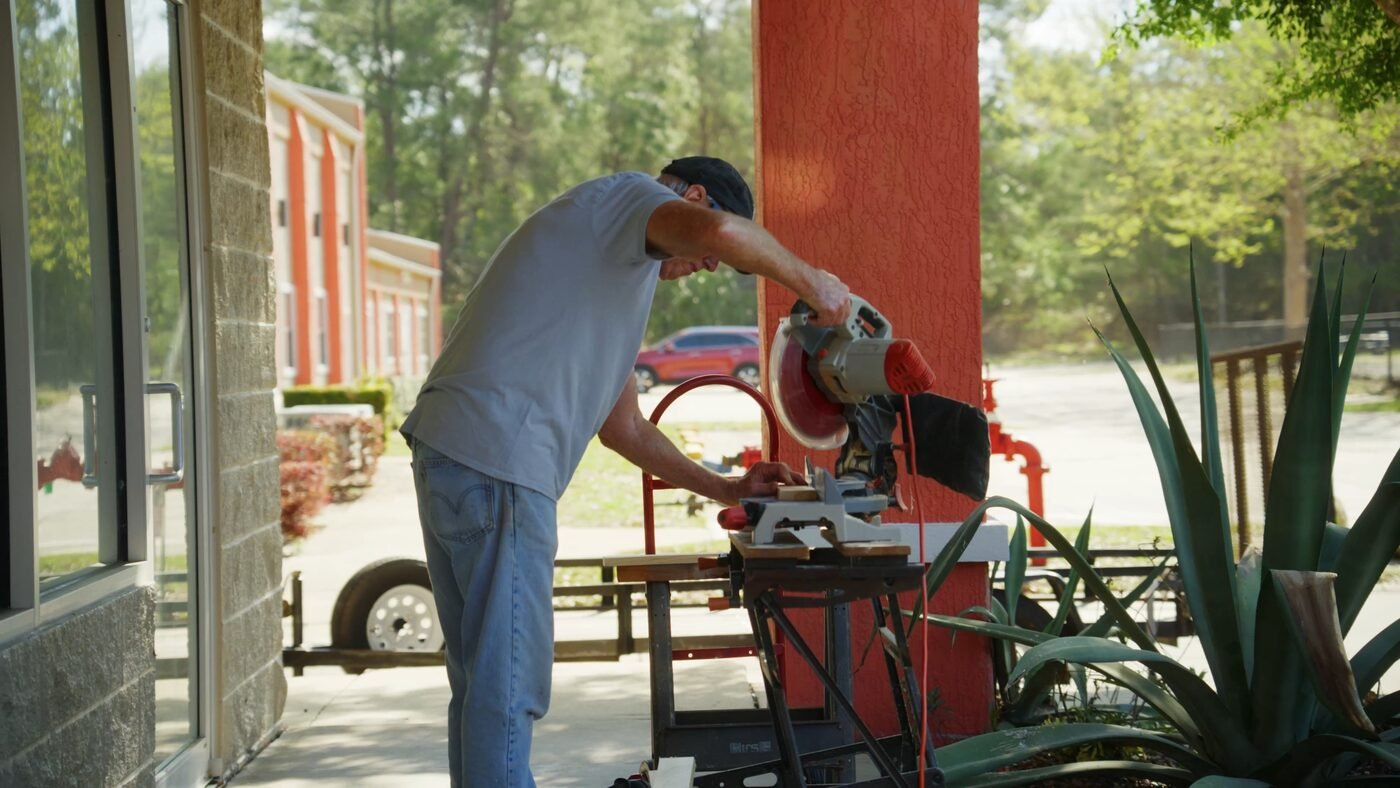 Videographer operating equipment on location for a commercial shoot